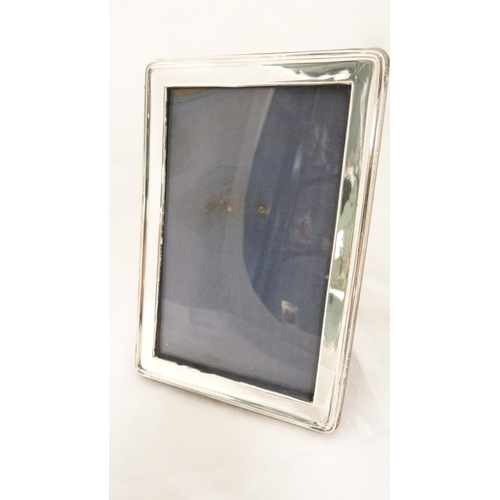 156 - Two silver mounted photo frames with plated mounted photo frame. (3)