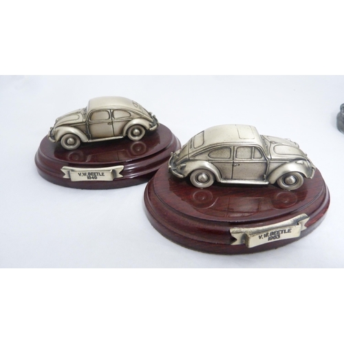 158 - Six classic car ornaments to include Volkswagen.