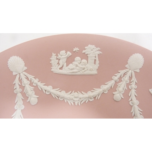 160 - Wedgwood pink jasperware classical themed plate and spill vase. (2)