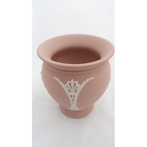 160 - Wedgwood pink jasperware classical themed plate and spill vase. (2)