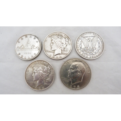 167 - Four USA one dollar coins, Years 1889, 1923, 1924 and 1972, with Canadian one dollar coin dated 1950... 