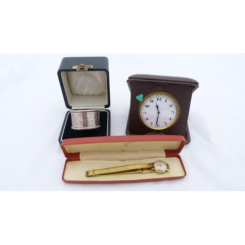 173 - Ladies wristwatch by Cyma, with 8 day travel watch and boxed silver napkin ring. (3)