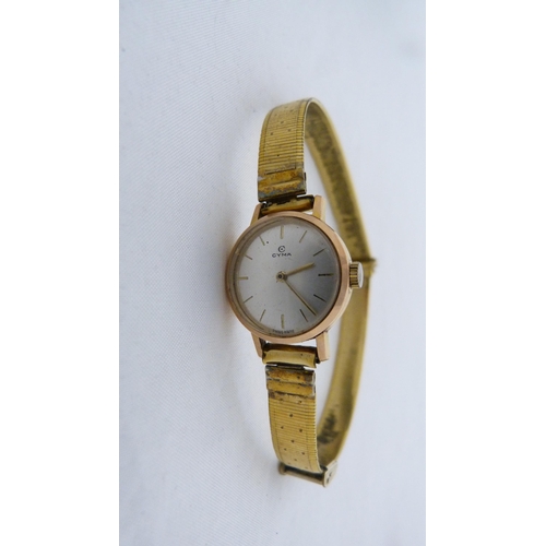 173 - Ladies wristwatch by Cyma, with 8 day travel watch and boxed silver napkin ring. (3)