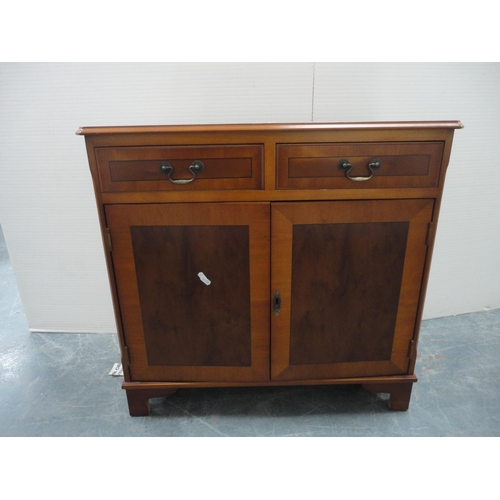 202 - Modern yew wood cupboard, and Reproduction plant stand. (2)