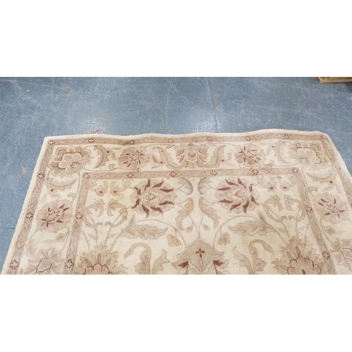 203 - Woollen hand-knotted Persian design rug and another.  (2)