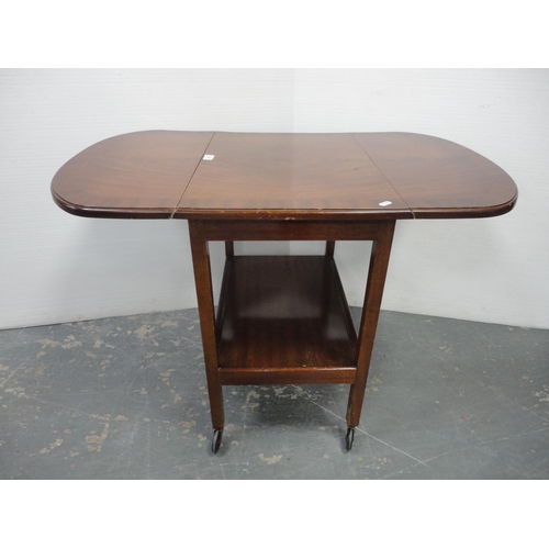 207 - Tea trolley and drum-shaped occasional table with tooled top. (2)