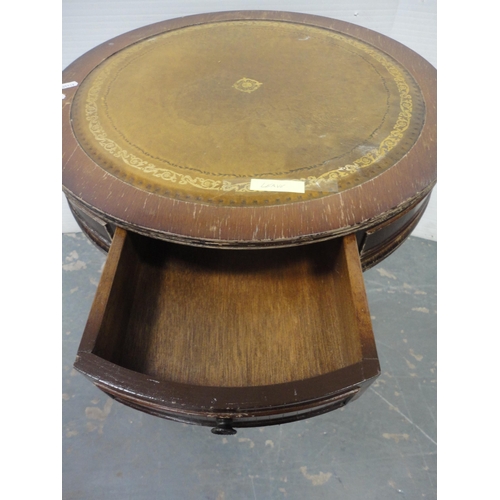 207 - Tea trolley and drum-shaped occasional table with tooled top. (2)