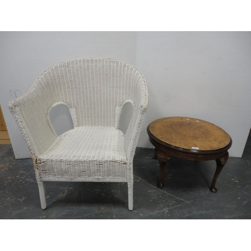 208 - Walnut coffee table and a wicker chair.  (2)