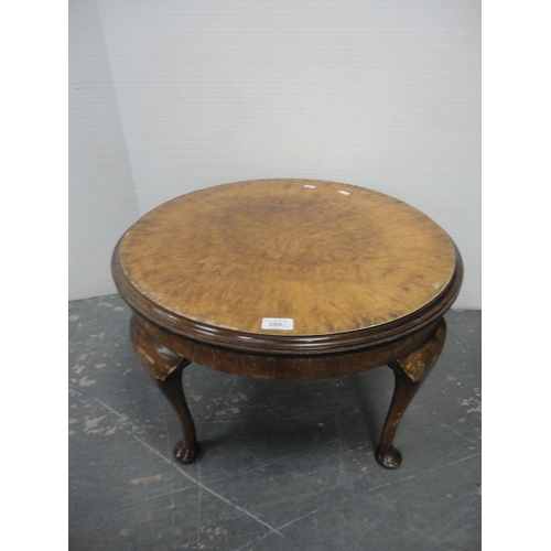 208 - Walnut coffee table and a wicker chair.  (2)