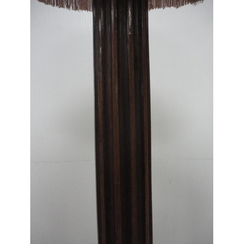 211 - Mahogany fluted floor lamp with shade.