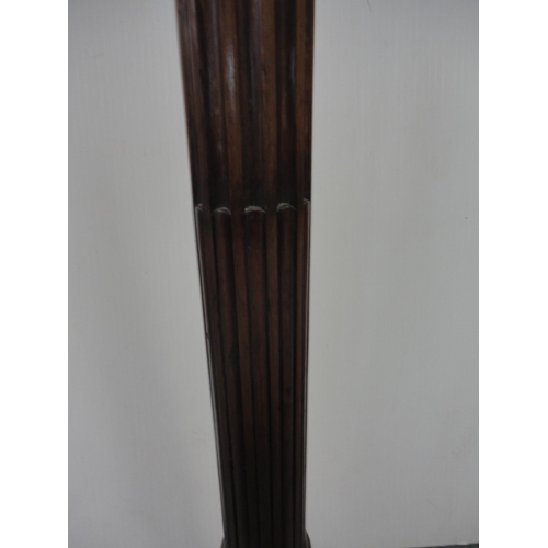 211 - Mahogany fluted floor lamp with shade.