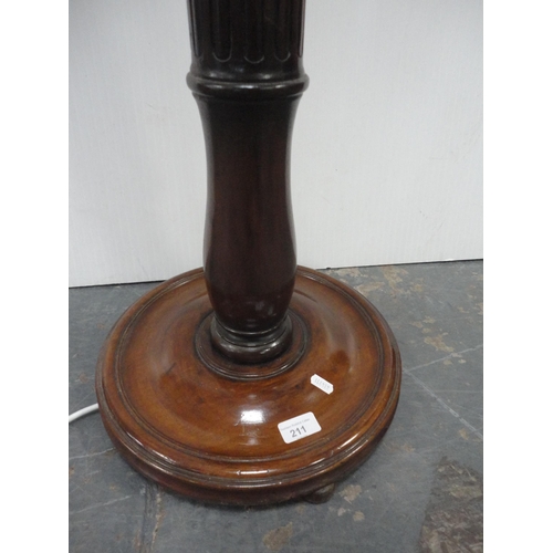 211 - Mahogany fluted floor lamp with shade.