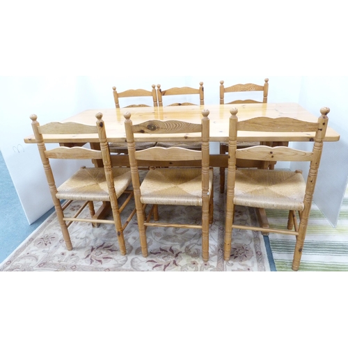 218 - Modern eight piece pine dining room suite, Comprising of dresser, table and six ladder back chairs. ... 