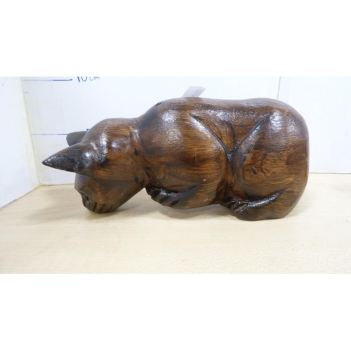 22 - Elephant and tortoise figures, bookends, Hornsea spill vases decorated with rabbits and others.