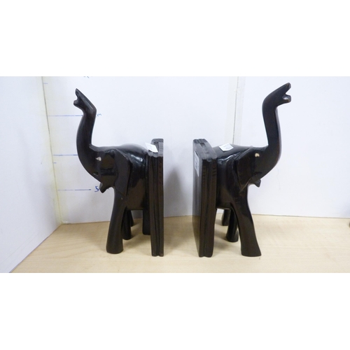 22 - Elephant and tortoise figures, bookends, Hornsea spill vases decorated with rabbits and others.