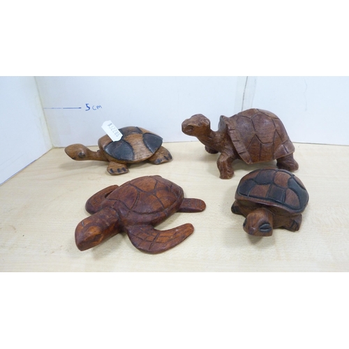 22 - Elephant and tortoise figures, bookends, Hornsea spill vases decorated with rabbits and others.