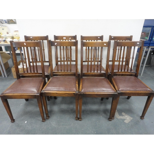 222 - Set of eight oak rail back dining chairs. (8)