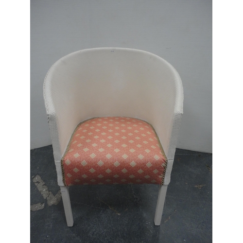 223 - Two painted wicker chairs, with painted wicker ottoman. (3)