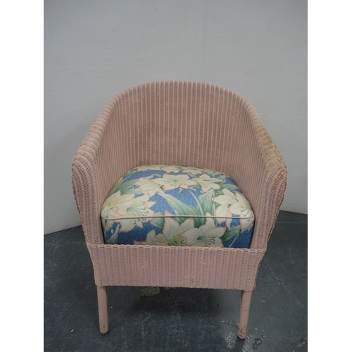 223 - Two painted wicker chairs, with painted wicker ottoman. (3)