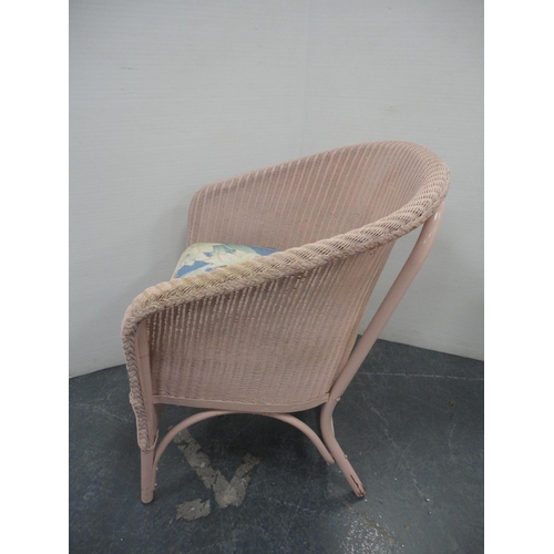 223 - Two painted wicker chairs, with painted wicker ottoman. (3)