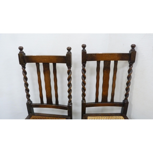 228 - Bergere walnut armchair, with pair of oak side chairs. (3)