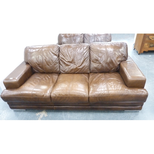 230 - Three-seater brown leather sofa and a matching two-seater sofa.  (2)