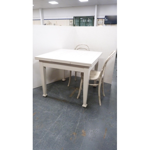 231 - Painted draw leaf dining table, with pair of painted bentwood chairs. (3)