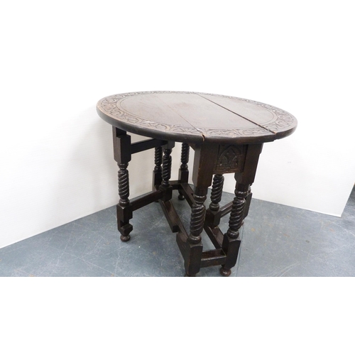 239 - Small carved oak supper table. 