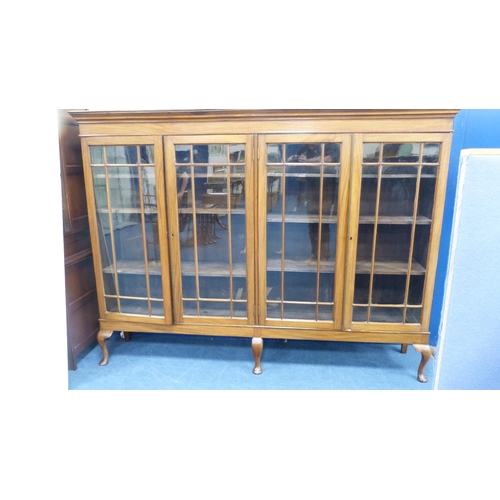 247 - Mahogany glazed four door bookcase.