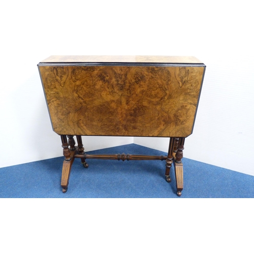 255 - Victorian burr walnut and ebonised sutherland table.