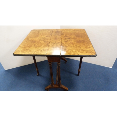 255 - Victorian burr walnut and ebonised sutherland table.