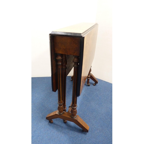 255 - Victorian burr walnut and ebonised sutherland table.