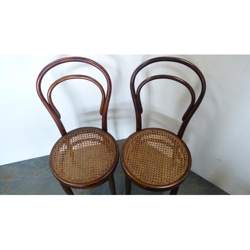 257 - Pair of Bentwood cafe chairs, with shaped mahogany occasional table. (3)