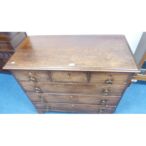 258 - Georgian mahogany three over three chest of drawers, with later handles.