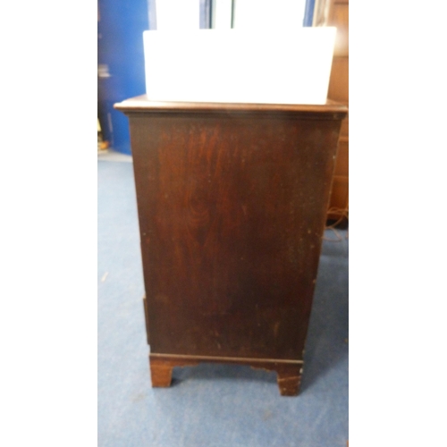 258 - Georgian mahogany three over three chest of drawers, with later handles.