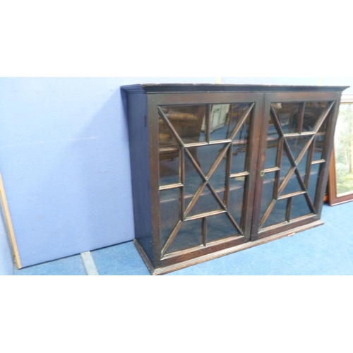 259 - 19th century glazed mahogany two door bookcase.