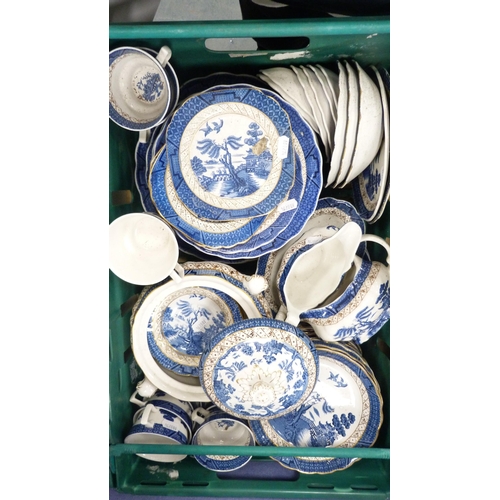 33 - Two cartons containing a large quantity of Booth's 'Real Old Willow' pattern table and dinnerwares, ... 