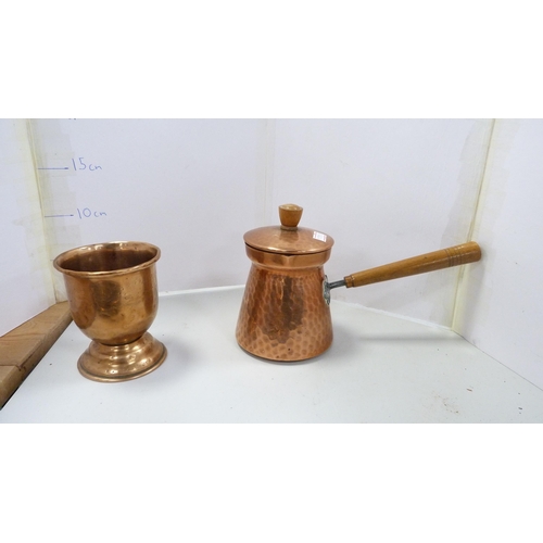 43 - Group of copper wares to include trays, Middle Eastern-type pot, beakers etc.