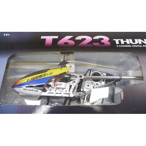 45 - T263 Thunderbird three-channel digital helicopter, boxed, and a boxed Recon observation drone, a rem... 