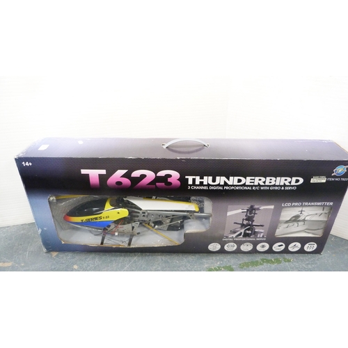 45 - T263 Thunderbird three-channel digital helicopter, boxed, and a boxed Recon observation drone, a rem... 