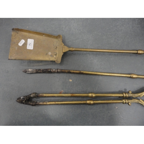 74 - Set of three brass fire irons with set of tongs and pair of brass fire dogs.