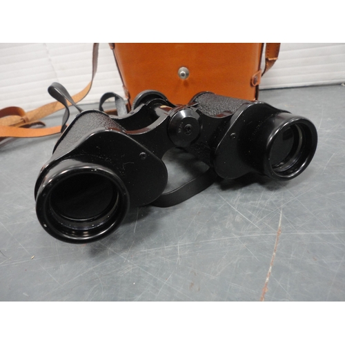 78 - Two pairs of cased binoculars, one set by Greenkat.