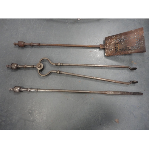 80 - Two sets of three steel fire irons with similar period fire dogs and accessories.