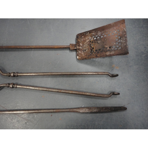 80 - Two sets of three steel fire irons with similar period fire dogs and accessories.