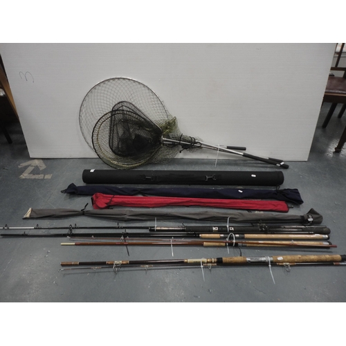 83 - Group of split cane fishing rods, some cased, with fishing nets.