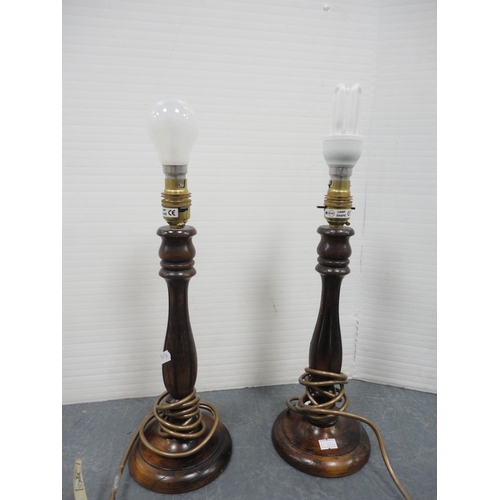 87 - Two near matching turned wood table lamps with two others and shades.