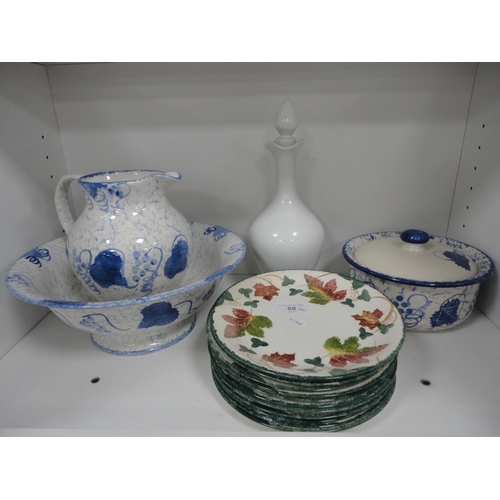 88 - Shelve lot of ceramics to include Poole Pottery ewer and basin, leaf decorated plates etc.