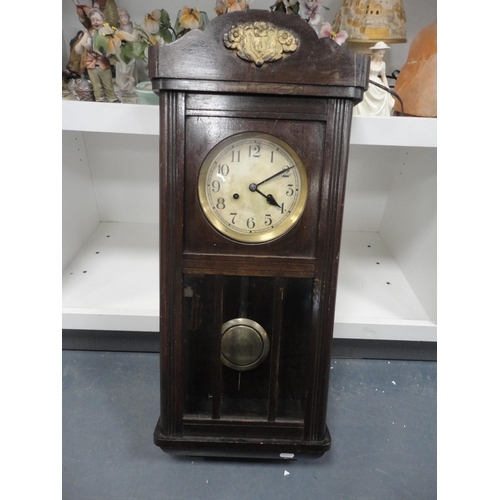 90 - Three shelves of assorted ceramics, table lamps and wall clock.