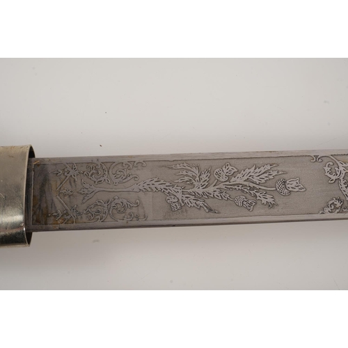 1674 - Early 20th century Scottish pipers dirk having white metal mounts, the blade with etched designs of ... 