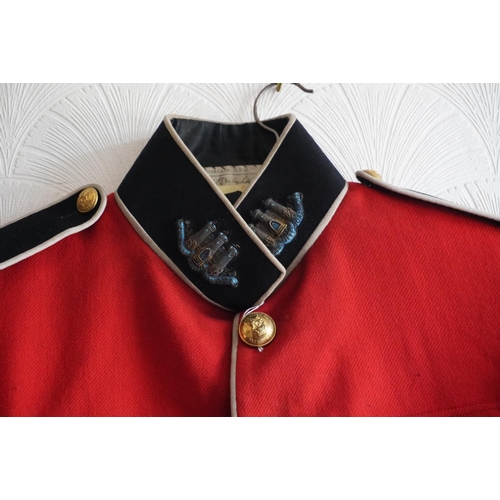 1745 - British army uniform, a red doublet jacket with Hawkes and Co of London label, having Hawkes and Co ... 